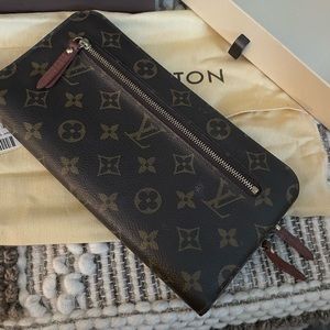 Louis Vuitton Insolite Monogram Organizer wallet.